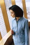 Businesswoman Looking out Window